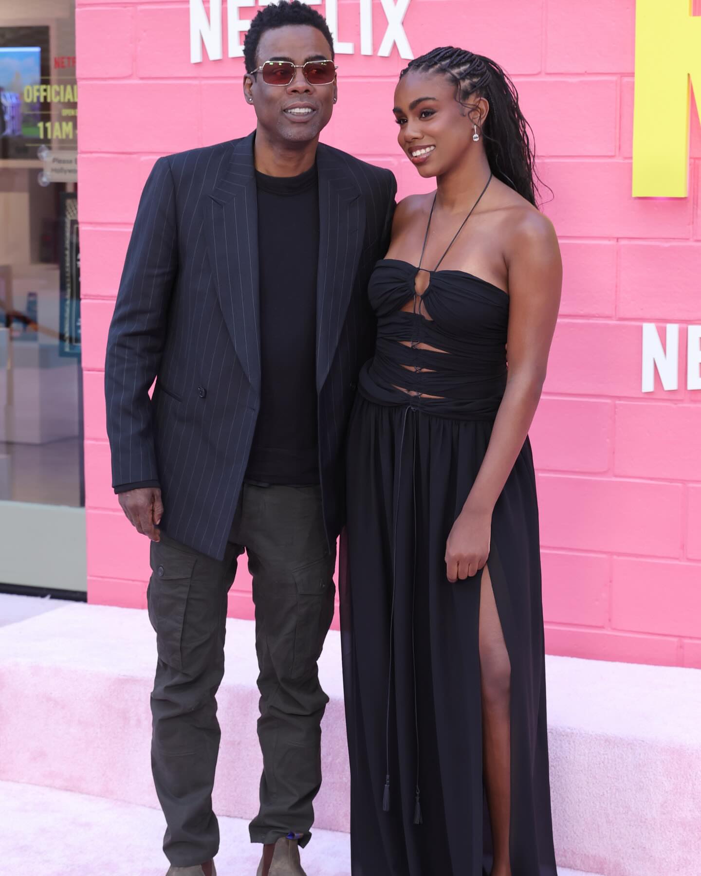 5 On The Scene At The Netflix Roommates Premiere Eddie Murphy Chris Rock Adam Sandler And Their Daughters In Black Silk Cut Out Gowns And Red Satin