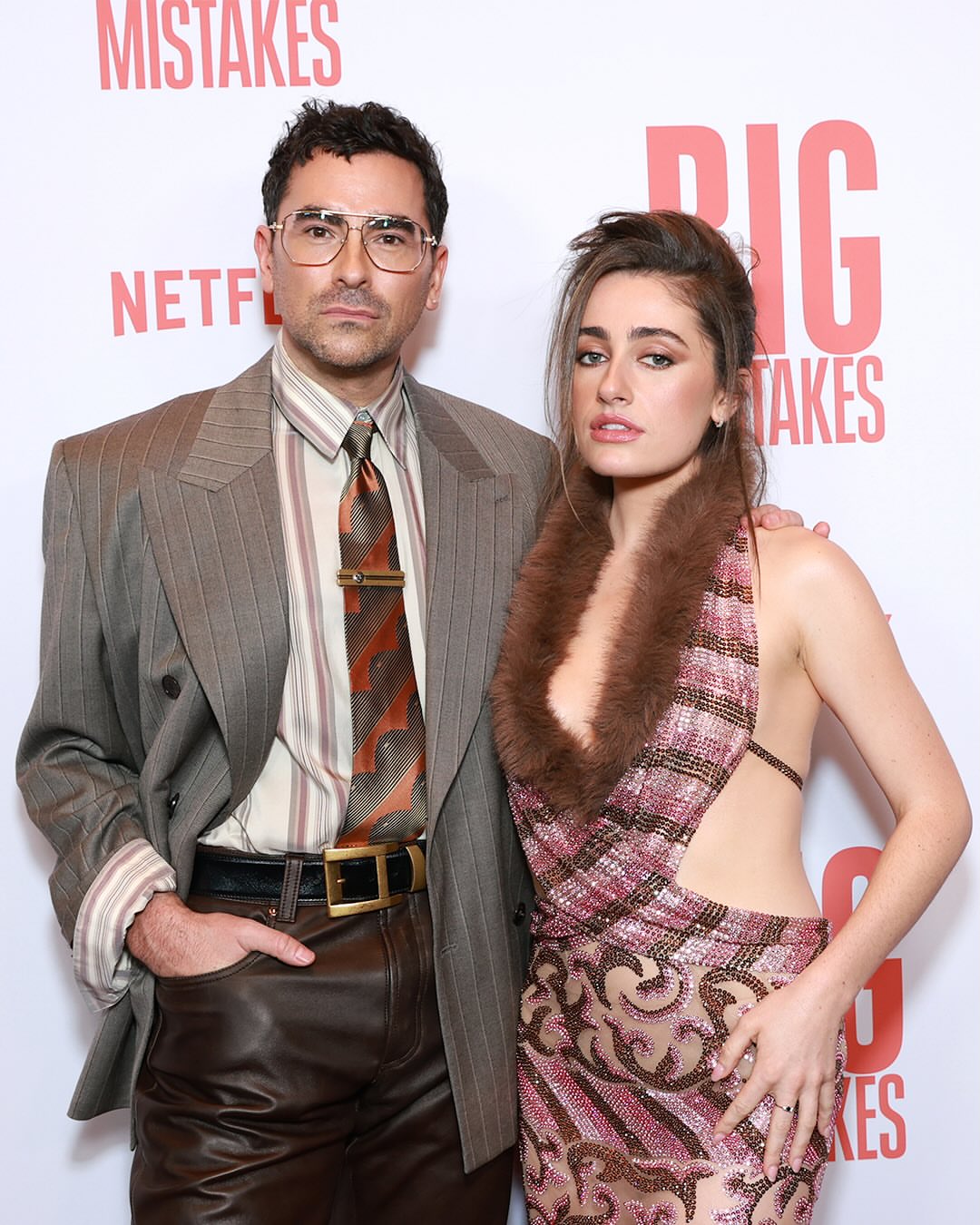 9 Dan Levy In Grey Pinstripe Versace Spring 2026 Blazer Brown Leather Pants And Silk Shirt At Big Mistakes Premiere