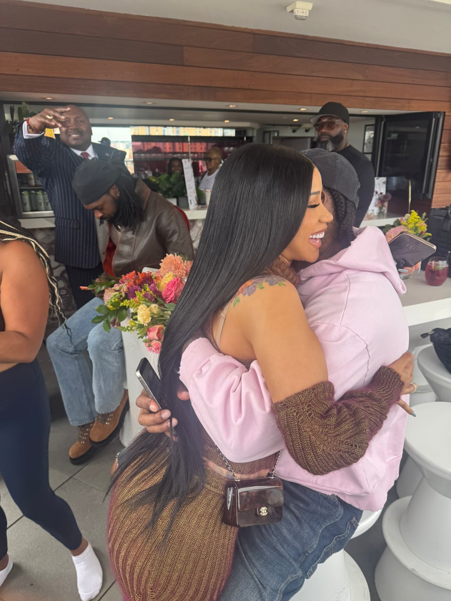 1 Cardi B Wore A Brown Vivienne Westwood Knit Set To The Diggs Deep Foundation Wellness Event With Stefon Diggs