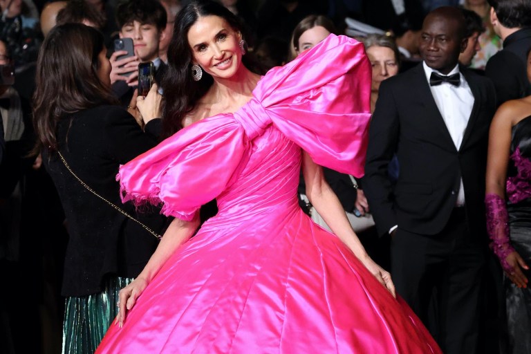 Demi Moore in Pink Silk Matieres Fecales at the “Paper Tiger” Premiere During the 79th Cannes Film Festival