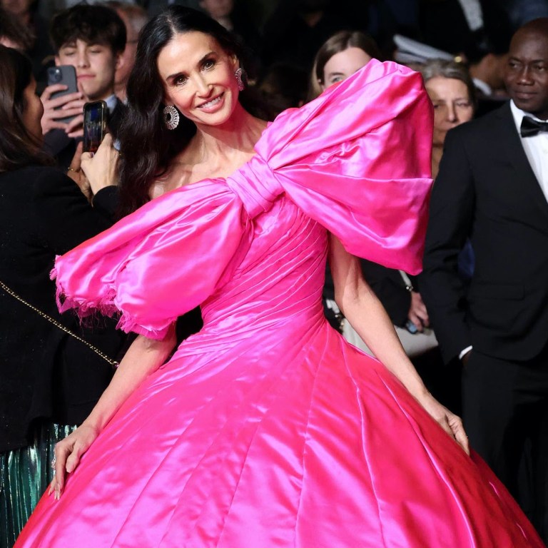 Demi Moore in Pink Silk Matieres Fecales at the “Paper Tiger” Premiere During the 79th Cannes Film Festival