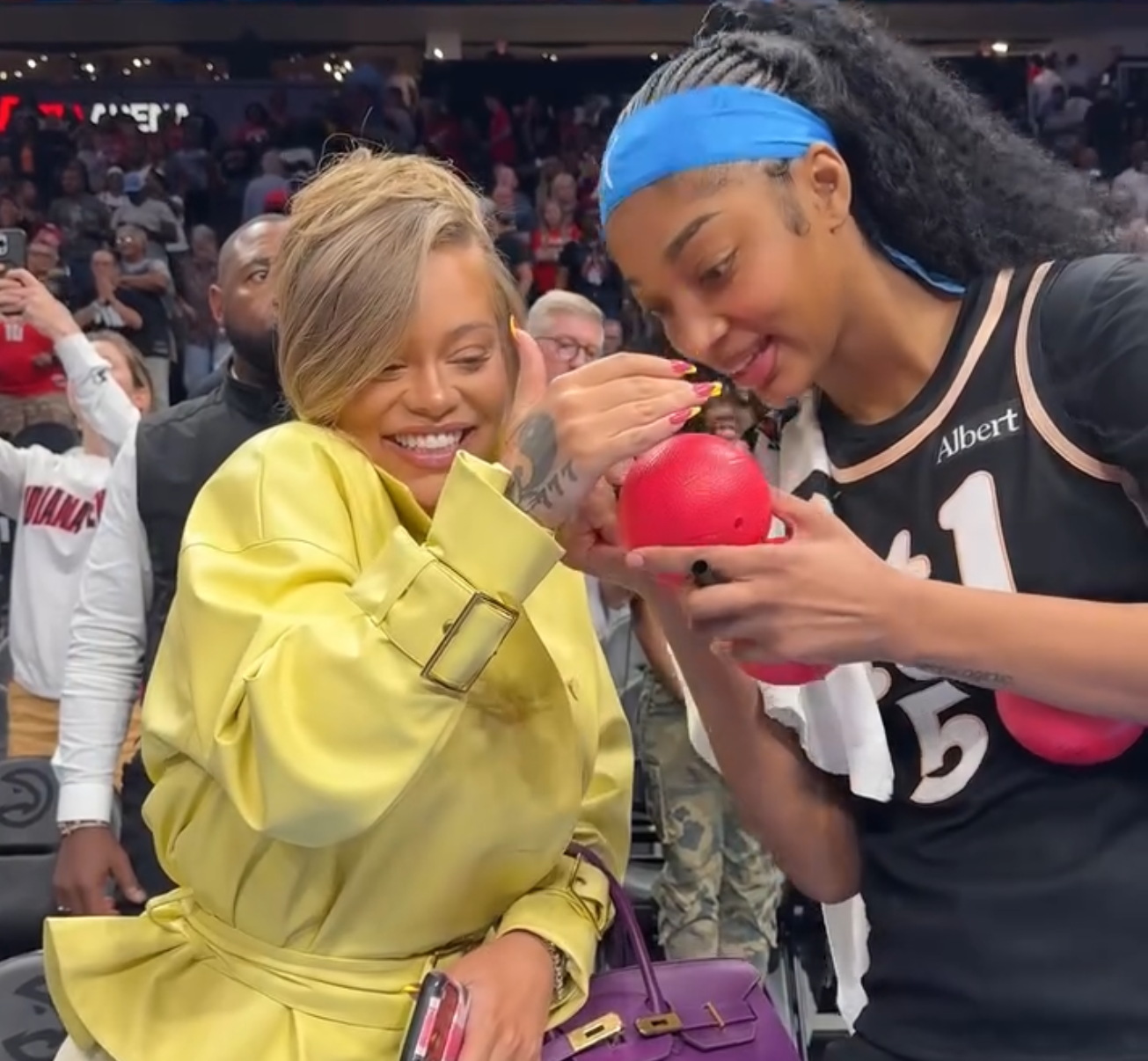 Latto Linked Up With Angel Reese Post-Game in Atlanta Wearing a Lemon Rowen Rose Set and Hermes Birkin Bag Latto Linked Up With Angel Reese Post-Game in Atlanta Wearing a Lemon Rowen Rose Set and Hermes Birkin Bag