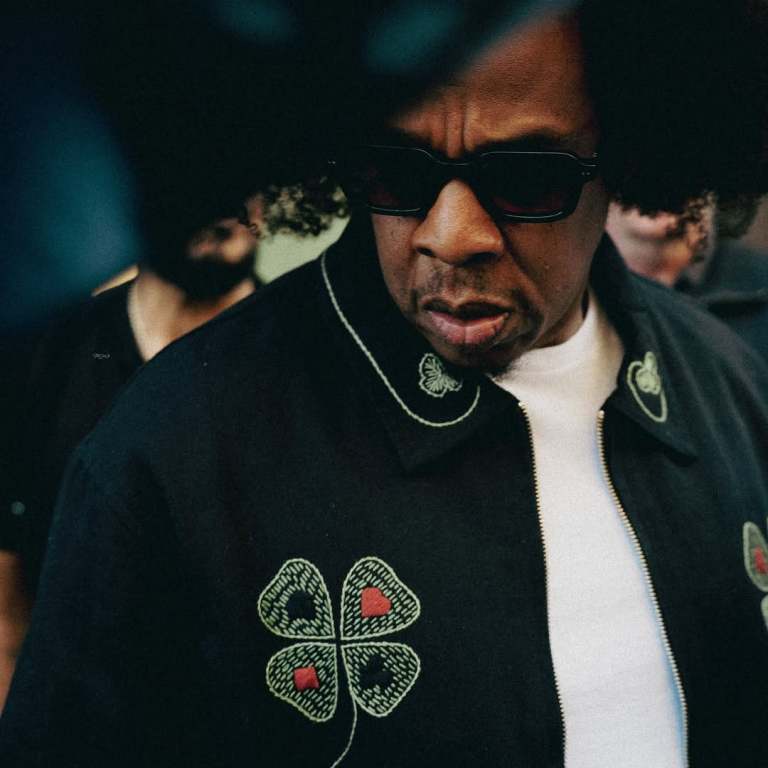 Jay-Z Wore His New Afro and a $1,183 Bode Lucky Draw Embroidered Jacket to the NBA Finals in New York City