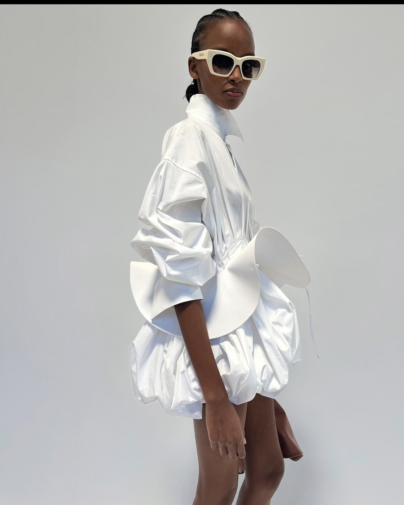9090 Nia Long Wore A Celine White Sculptural Shirt Dress And The Attico Ornella Dark Green Platform Stiletto Sandals At The Estee Lauder Pop Up Bus In New York City