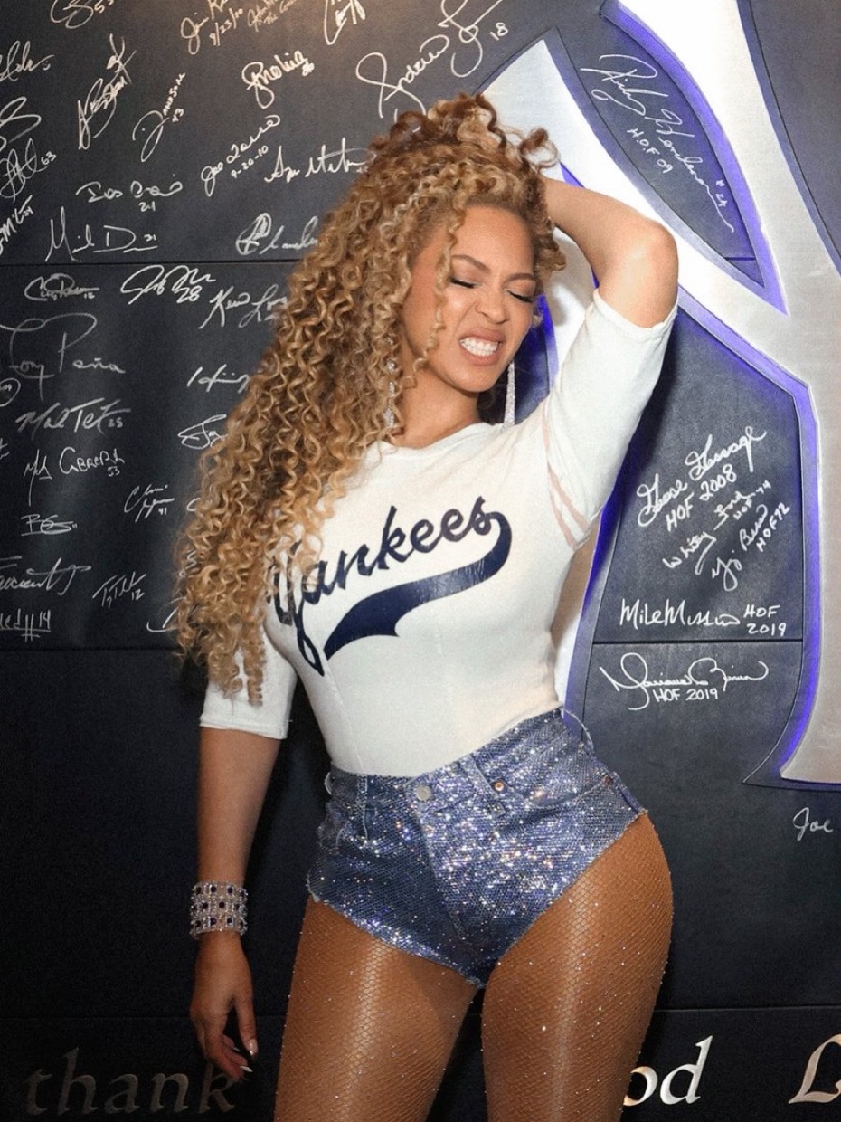 8 88 9909 Beyonce Sparkles In Custom Yankees Tee Levins Shorts And 150 DBleuDazzled Crystallized Fishnets At Jay Zs 30th Anniversary Celebration Jimmy Choo Timberland
