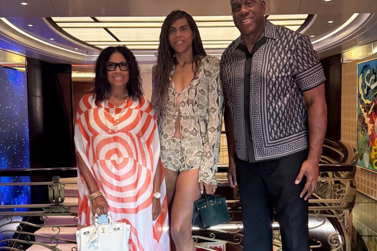 Magic Johnson, Cookie Johnson in Dries Van Noten, and EJ Johnson in Gucci Snake Shorts Set Enjoy Family Dinner in Croatia