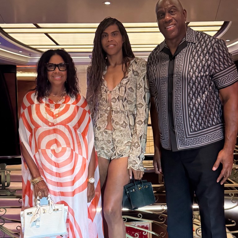 Magic Johnson, Cookie Johnson in Dries Van Noten, and EJ Johnson in Gucci Snake Shorts Set Enjoy Family Dinner in Croatia