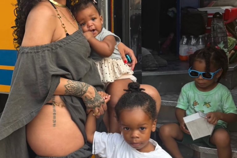 You Ask, We Answer! Rihanna Wore Vintage 1984 Comme des Garçons Gray Cover Up Dess in Barbados With Kids RZA, Riot, and Rocki