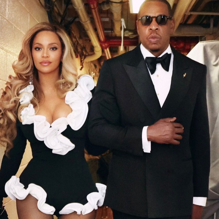 Beyoncé Wore a Custom Black and White Ruffled Rowen Rose Bodysuit and Daccori Platforms to the “Jaÿ-Z in 8” Premiere in NYC